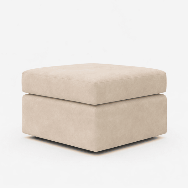 Cream plush fabric footstool designed for corner sofas, featuring soft cushioning and a stylish, comfortable addition to living room furniture.